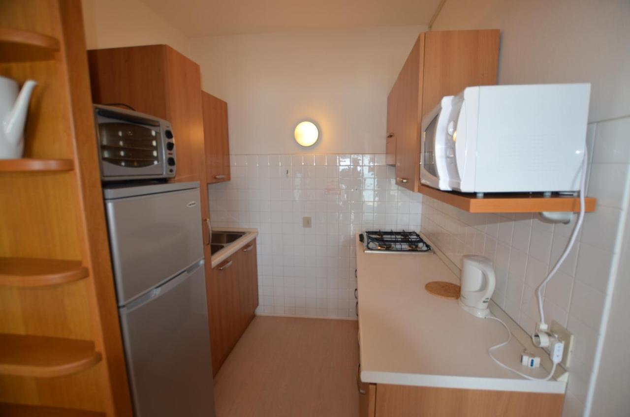 Apartamento Lignano Sabbiadoro Sea Front Exterior foto